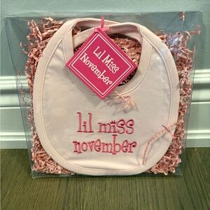 Mudpie brand pink little miss November bib new in box.